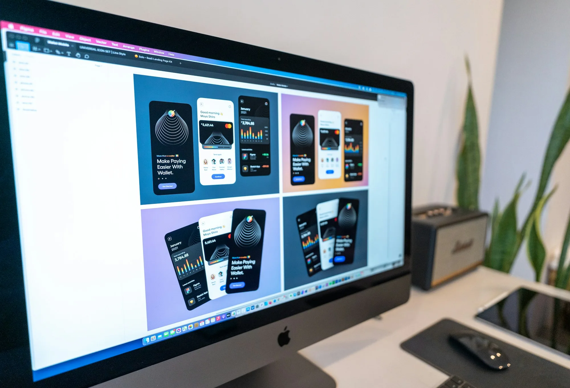 Desktop monitor showing a set of mobile ad design variants