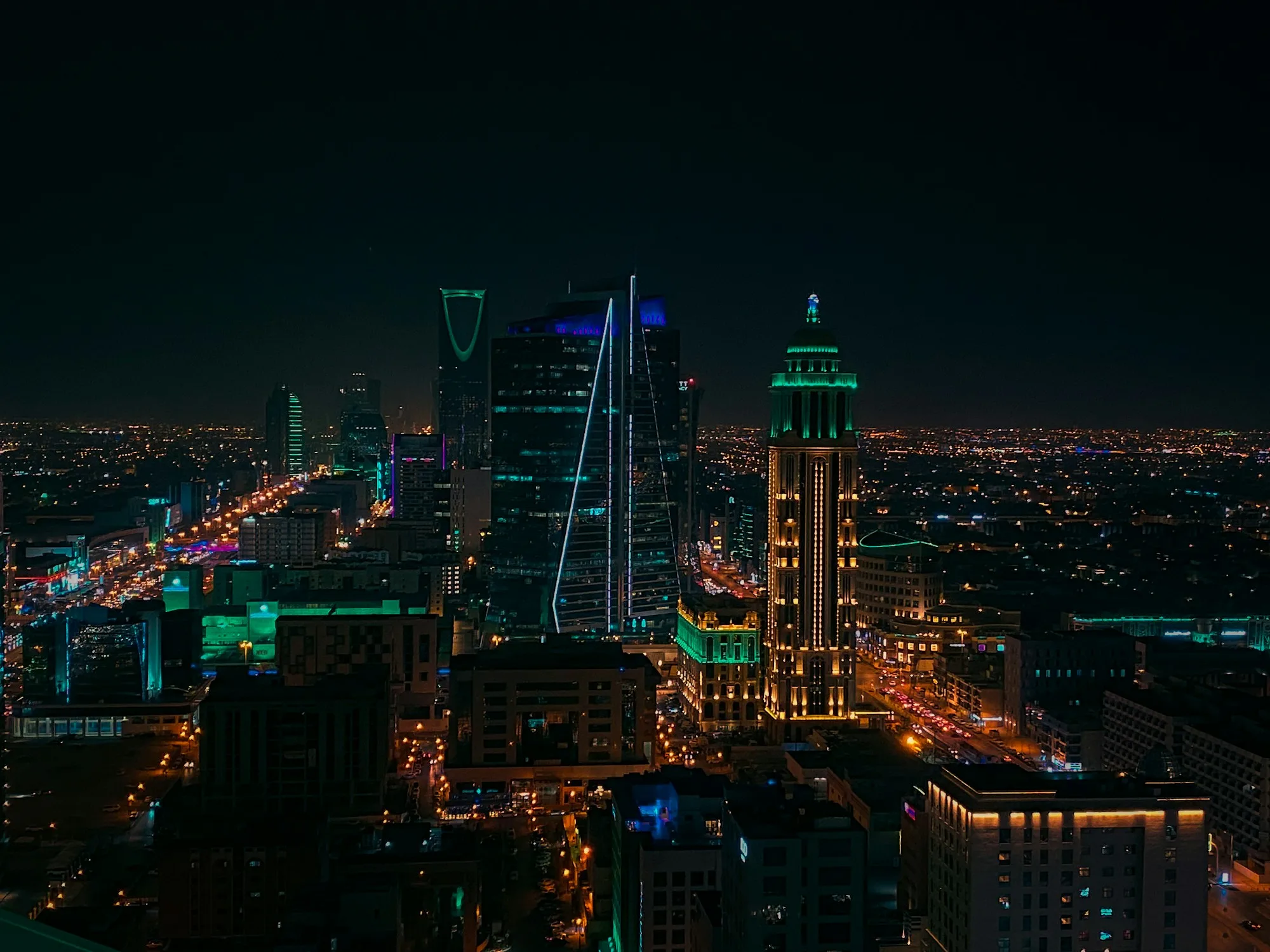 Riyadh skyline at night with the Kingdom Centre lit up